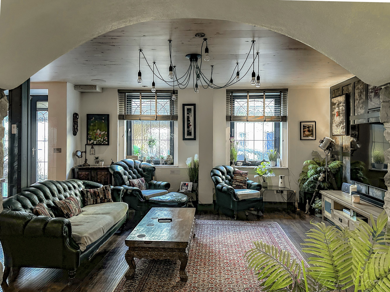View across the lounge at the hallway and the east catacomb showing two of the berrial chamber doors