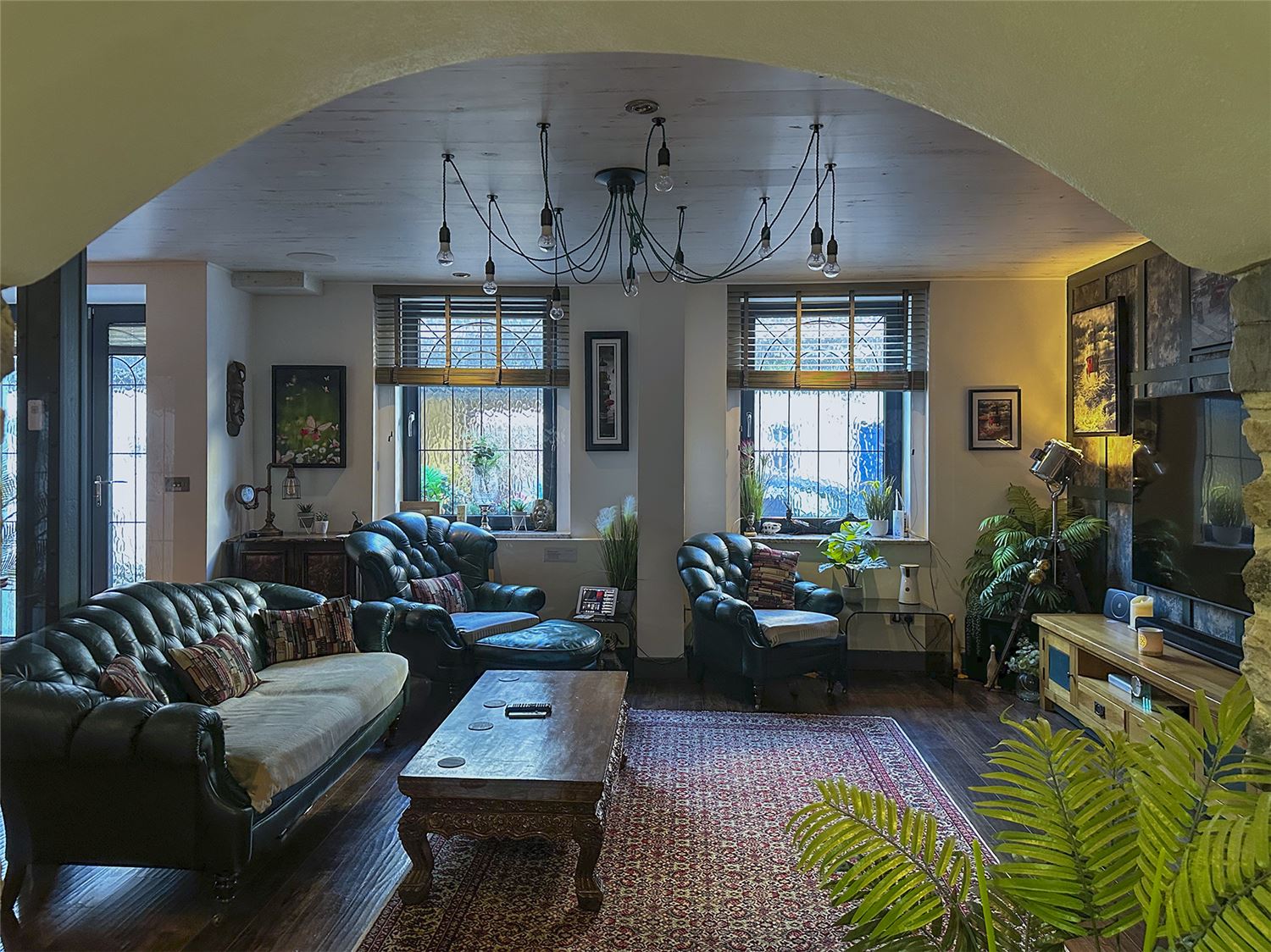 View across the lounge at the hallway and the east catacomb showing two of the berrial chamber doors